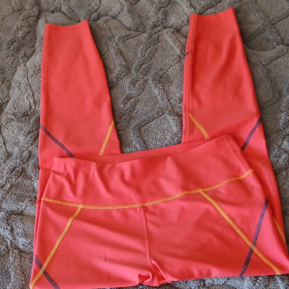 Puma Orange High-Waist Leggings with Geometric Design